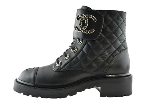 chanel black boots fall-winter 23/24|Chanel quilted combat boots.